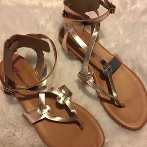 Breckelle’s gold strap sandals. 8.5